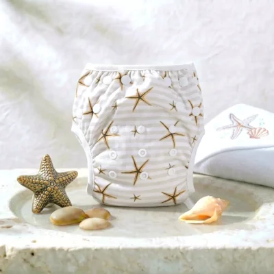 Couche de bain lavable – Coloris au choix